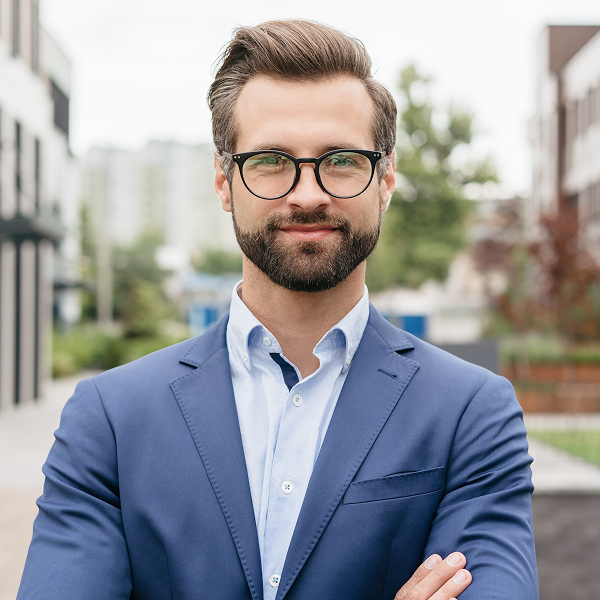 confident-businessman-wearing-suit-stylish-eyeglasses-standing-street-successful-business 2